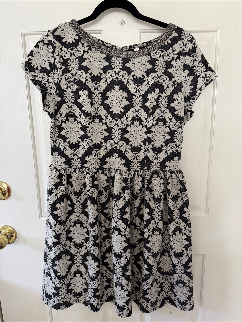 Printed dress by Target cute gold detail in the neck area. Key hole zip back